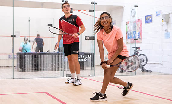 Male and female squash player